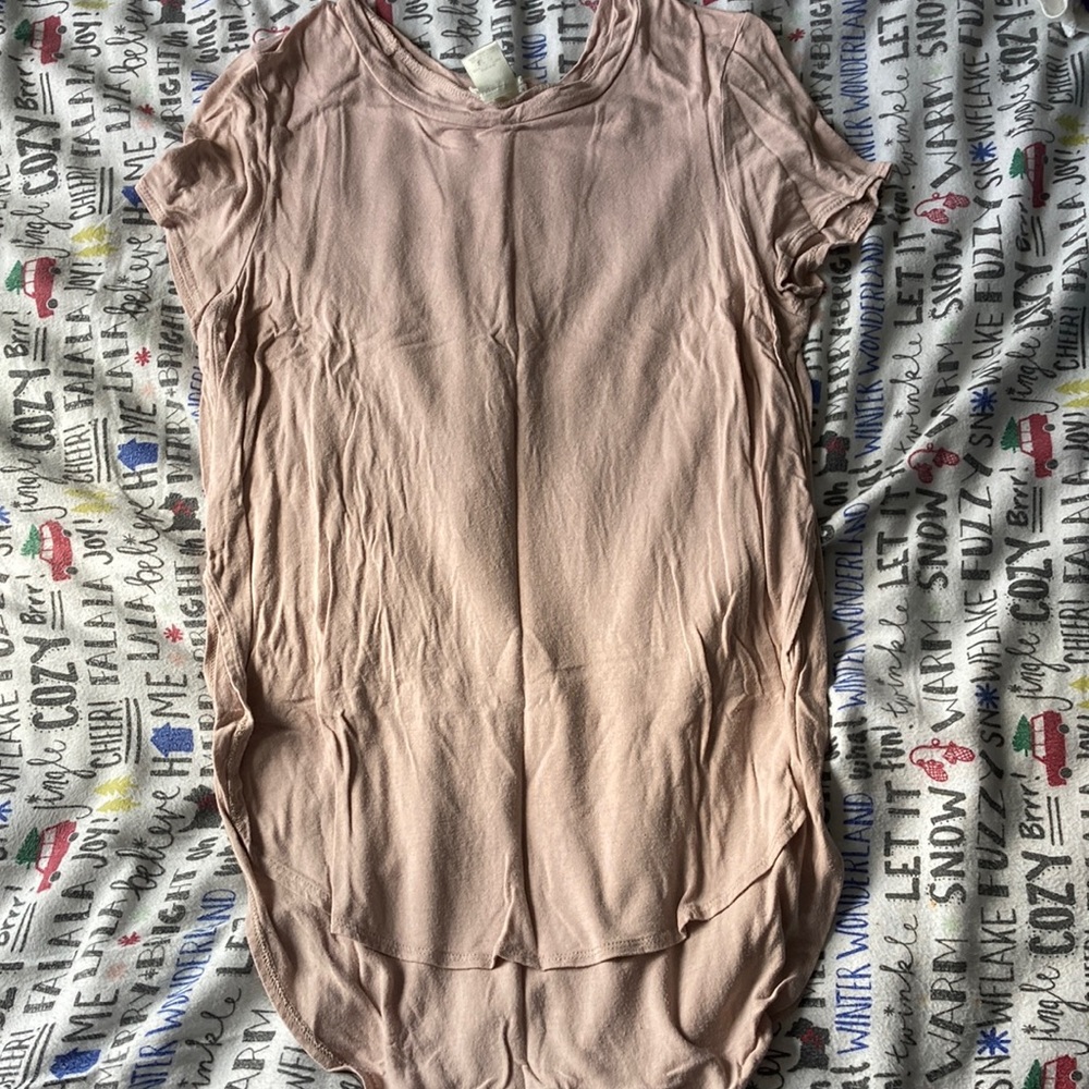 Long in the back shorter in the front baby pink tee
